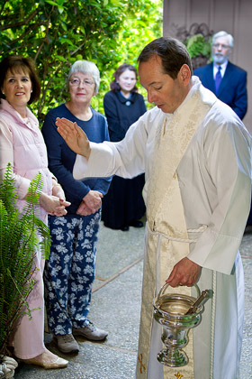 Fr. Penfield blesses the Priory sign