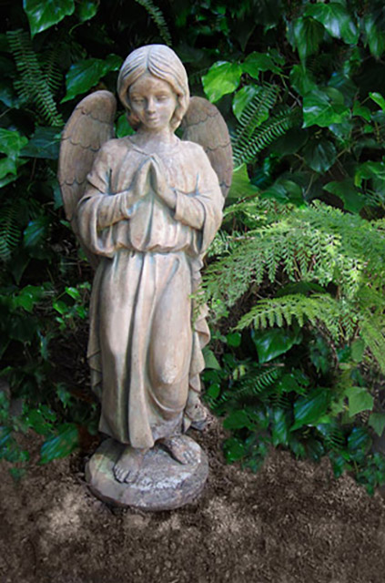 Praying angel statue